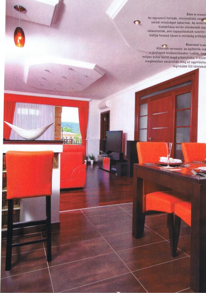 Narancssárga székek és TV-szekrény egy mediterrán otthonban