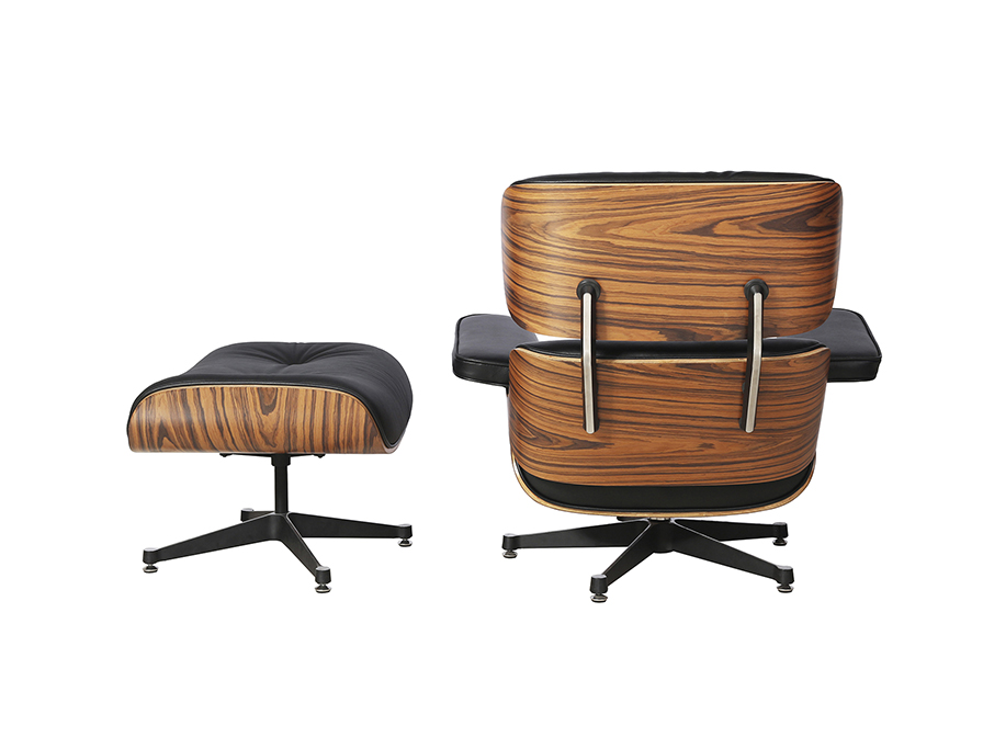 Eames pihenő szék 448370 Eames pihenő szék 448370 ergonomikusan kialakított fotelből, és egy hozzá illő lábtartóból áll, hajlított, és rétegelt lemez vázzal, fekete bőr kárpitozással.